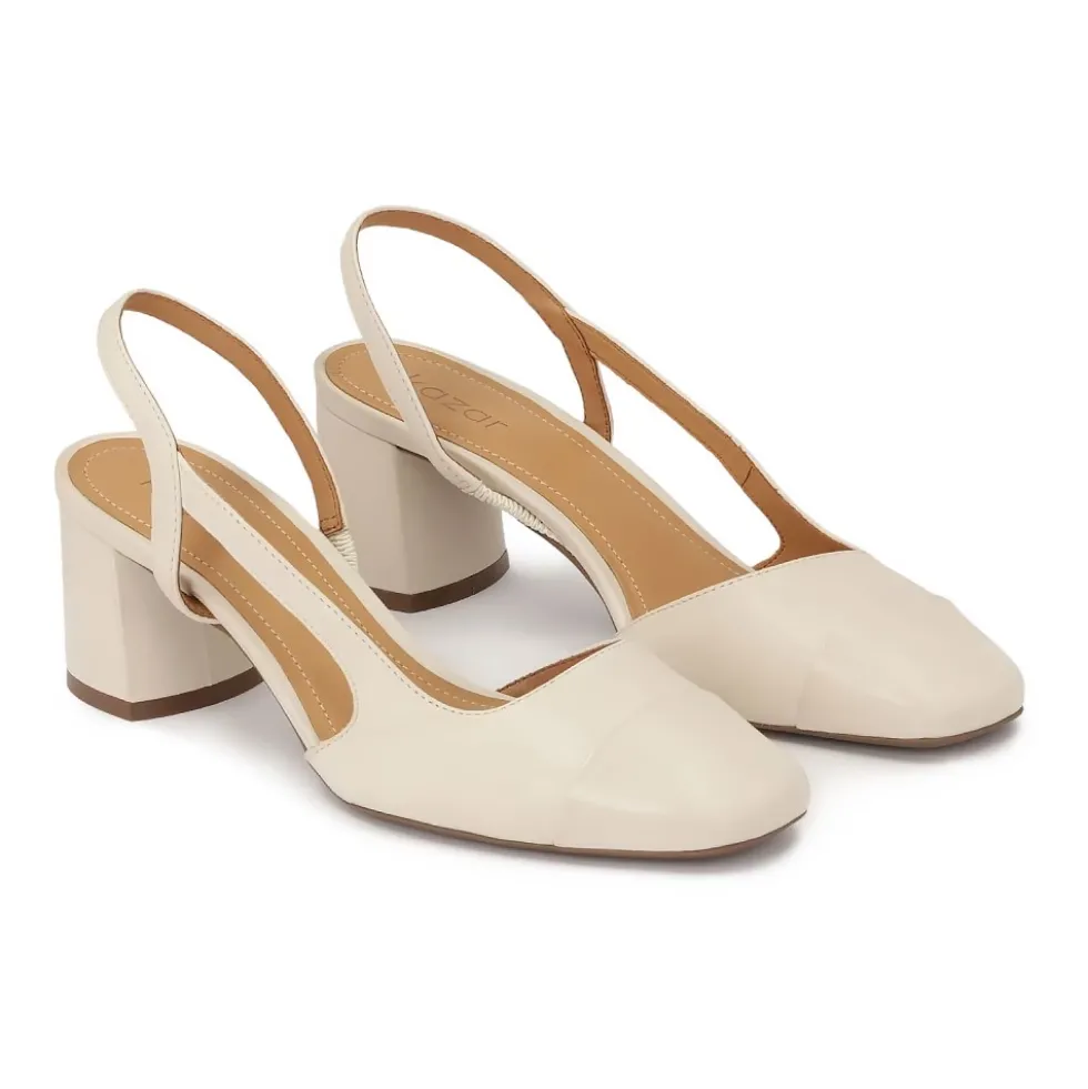Creme pumps med udskåret overdel